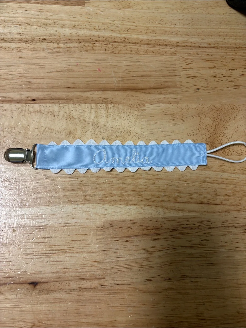 Personalized Light Blue Pacifier Clip with White Trim with Amelia